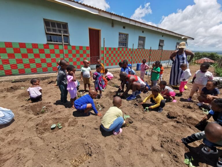 Helping little children learn to plant